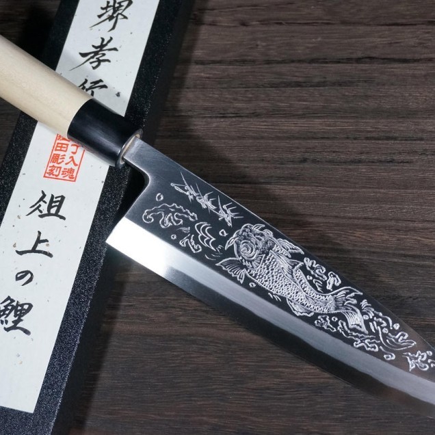 Гравіювання на ножах Фото